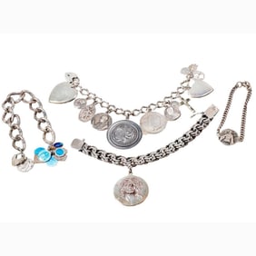 Four silver bracelets