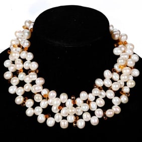 Four cultured pearl and gemstone necklaces