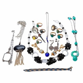 A group of antique silver, metal and costume jewelry