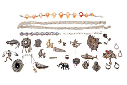 A group of silver, metal and stone-set jewelry