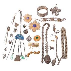 A group of silver jewelry