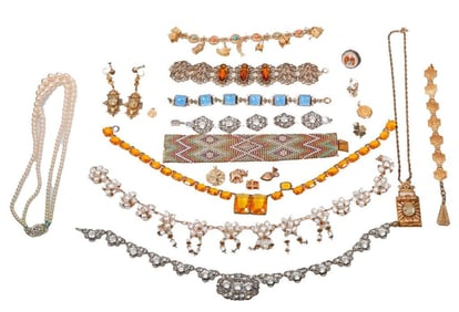 A group of antique silver, metal and gold-filled jewelry
