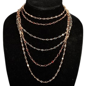 Three gem-set and gilt-silver station necklaces