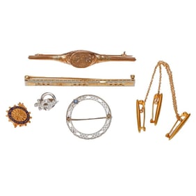 A group of five pins