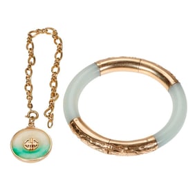 Two jade and gold bracelets