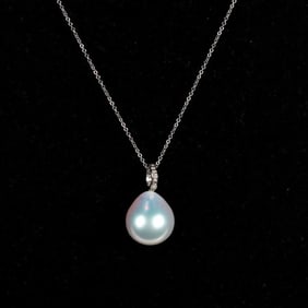 A South Sea cultured pearl, and diamond pendant