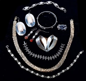 A group of silver and stone jewelry