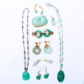 A group of jade jewelry and elements
