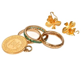 A group of gem-set and gold jewelry