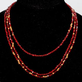 A garnet and10k gold beaded necklace