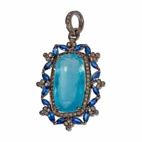 An aquamarine, sapphire and diamond pendant