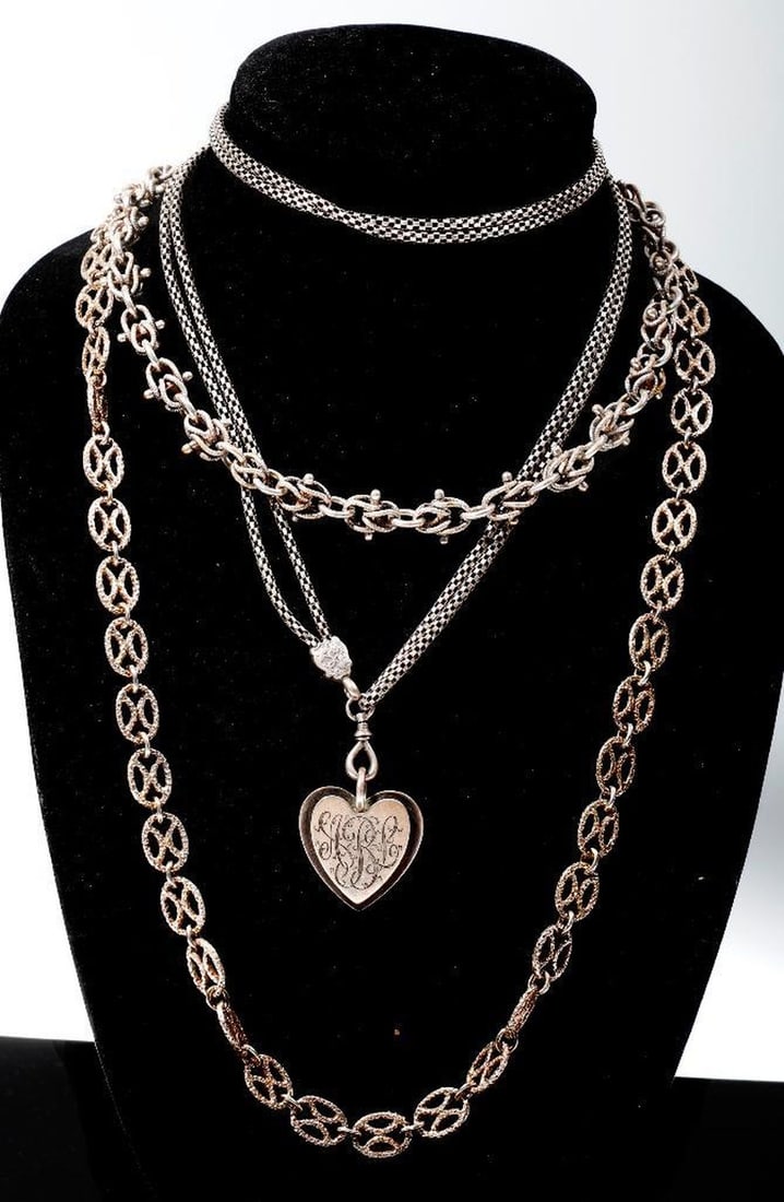 Six silver watch chains and necklaces: including a LaPaglia heart motif pendant; gross weight approximately 226.0 grams