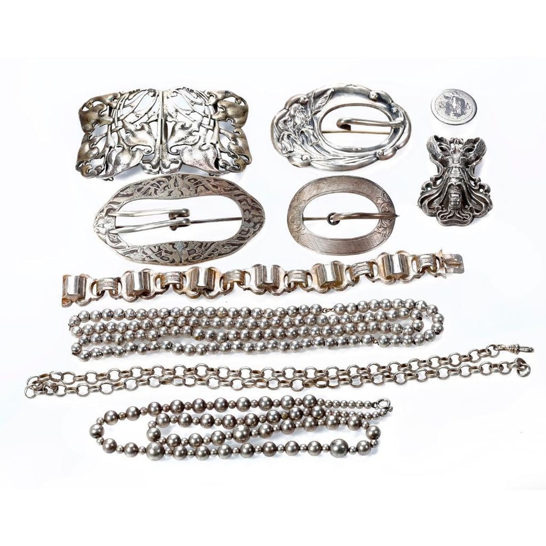 A group of antique silver jewelry (1 of 7)