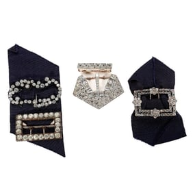 A group of antique paste, silver and metal buckles