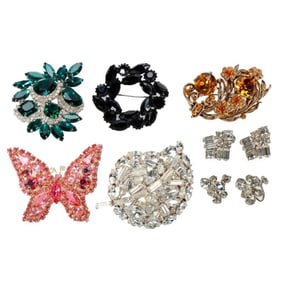 A group of costume jewelry