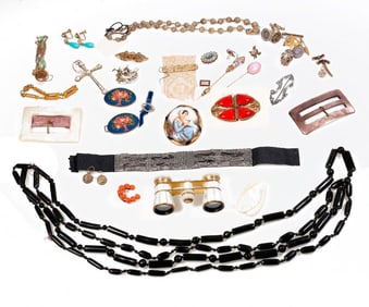 A group of antique costume and gilt silver jewelry