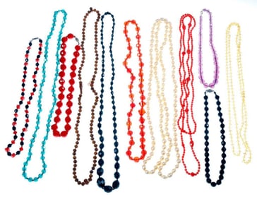 A group of beaded necklaces