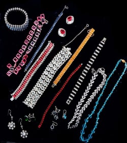 A group of antique costume, silver and metal jewelry