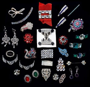 A group of antique costume, silver and metal jewelry