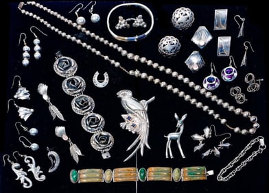 A group of silver jewelry