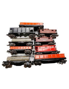 (9) Lionel O Gauge Prewar Freight Cars: (9) Lionel O Gauge Prewar Freight Cars 1689 Sunoco gray tank car. Nickel domes, steps, trucks and couplers intact. Black journal covers. Scratches and wear to lithography. Chassis has edgewear to blac