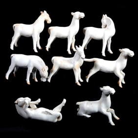 Eight Blanc de Chine Miniature Horses, with cabinet