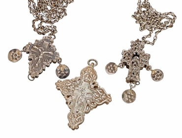 Three Assorted Silver Metal Cross Pendants