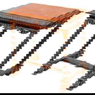 Spanish Style Rojo Alicante Marble Top Table: Circa Early 20th Century. The gilt and ebonized table with red marble top and foliate twist legs on lion head feet; 25 1/2" x 26 1/2" x 18". With label for Pizzi & Hunt, 565 Sutter St., San Francisco.