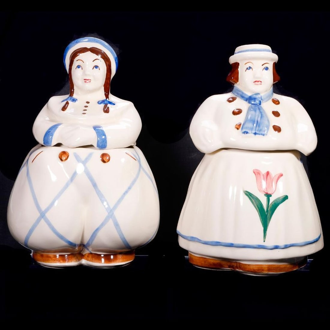 American Bisque Child Pair Cookie Jars: The boy and girl ceramic cookie jars both marked U.S.A. Approx. 11" tall. Good condition.