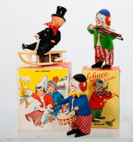 Three Vintage German Windup Toy Figures, Clowns and Sledding Boy
