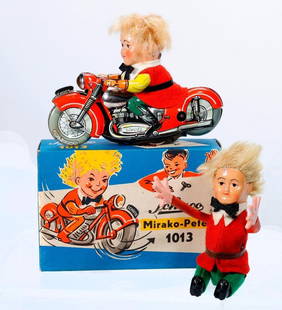 Vintage German Schuco Mirako-Peter, with a Tumbling Peter: An original Schuco Made in Western Germany Mirako-Peter 1013, tin litho motorcycle windup toy, with box. Together with a Schuco tumbling Peter. Tallest 5". With keys. Good condition (the tumbler's hai