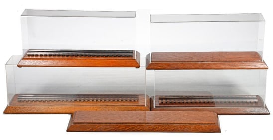 Four O gauge Plexiglass Display cases and a base