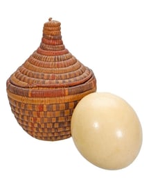 An Ostrich Egg in Ethnic Basket