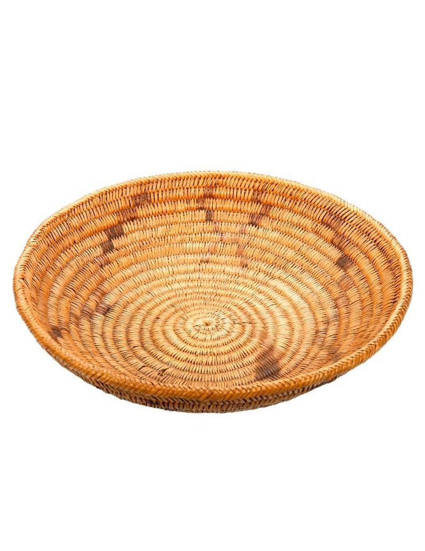 A Navajo or San Juan Paiute Tray: The Navajo/San Juan Paiute tray approx. 3 3/4" high x 11 3/4" diam. Condition good, light wear; small area of green staining on outside.