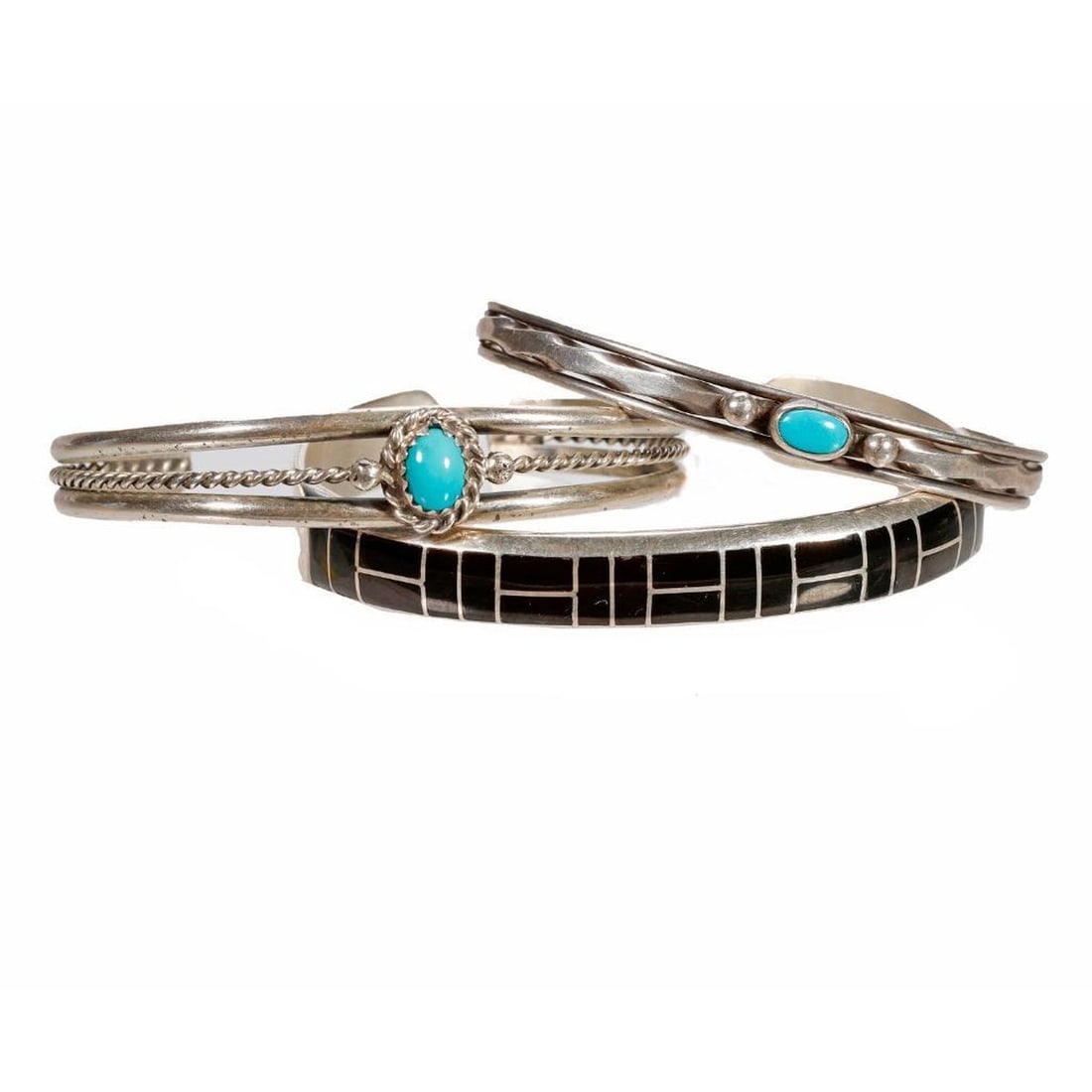 Vintage Native American Southwest Cuff Bracelets: Three (3) Old Pawn turquoise, hard stone and silver cuff bracelets. Approximately: 1/4 inches wide largest example. Approximate size: 5 3/4 inches, which includes the additional wrist gap, largest exa