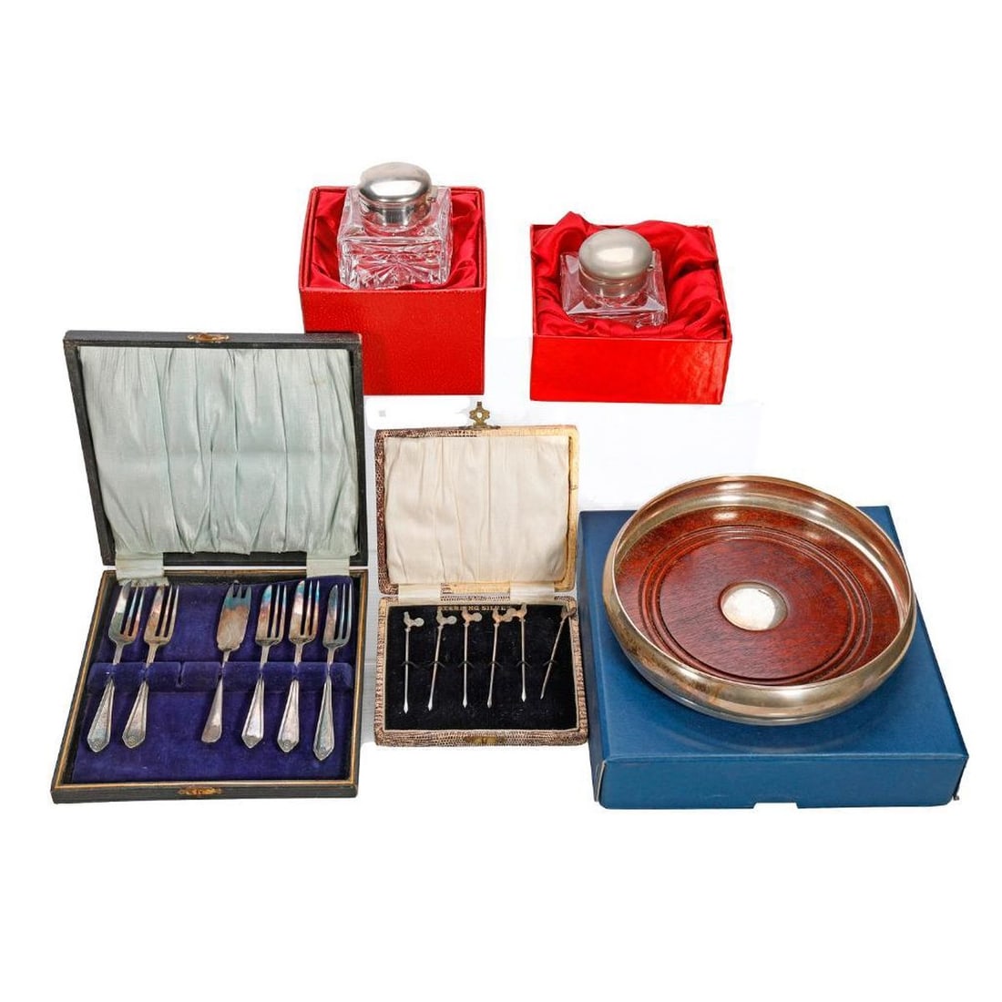 English Sterling and Sheffield Plate Lot: Comprising a Broadway & Co sterling mounted wood barrel decanter coaster, Birmingham, c. 1912, 1.75"h x 7.5"d; two boxed Royal Brierley silver plated and crystal inkwells, each 2.5" x 3" square; a box