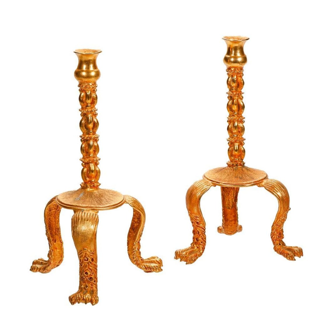 Pair Lazaro Diaz Gilt Metal Candlesticks: Circa 1992, each organic standard cast in gilt metal, supporting an urn form candle cup, rising on tripod legs, ending in lion's paw feet, signed "Lazaro 92", 11"h x 6.5"d. Condition: some scratches,
