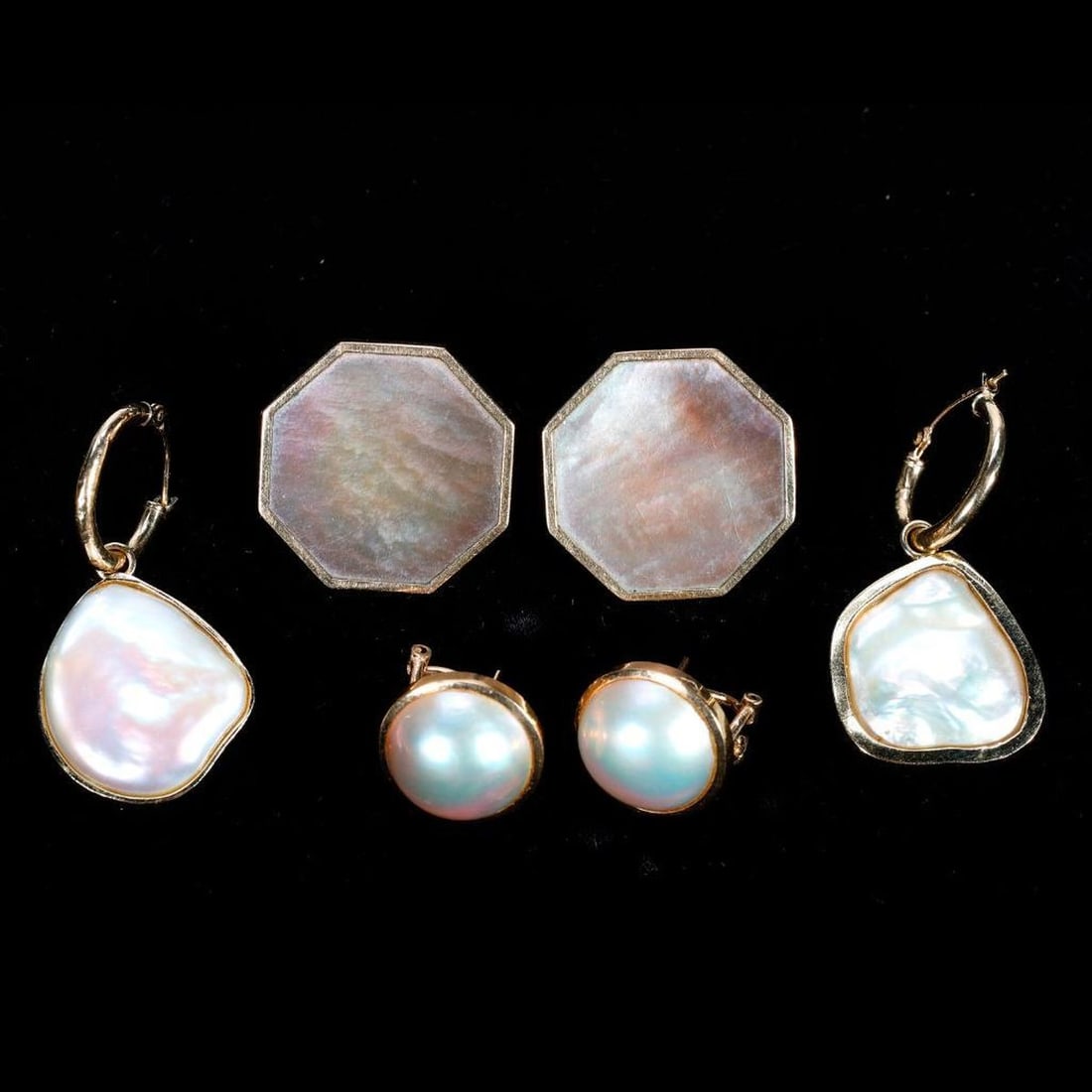 Three pairs of cultured pearl and 14k gold earrings: including mabe, freeform and mother-of-pearl; gross weight 24.99 grams; lengths: 1/2 to 1 1/2 in.