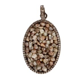 A diamond and silver pendant