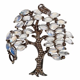 A moonstone, diamond & blackened silver pendant