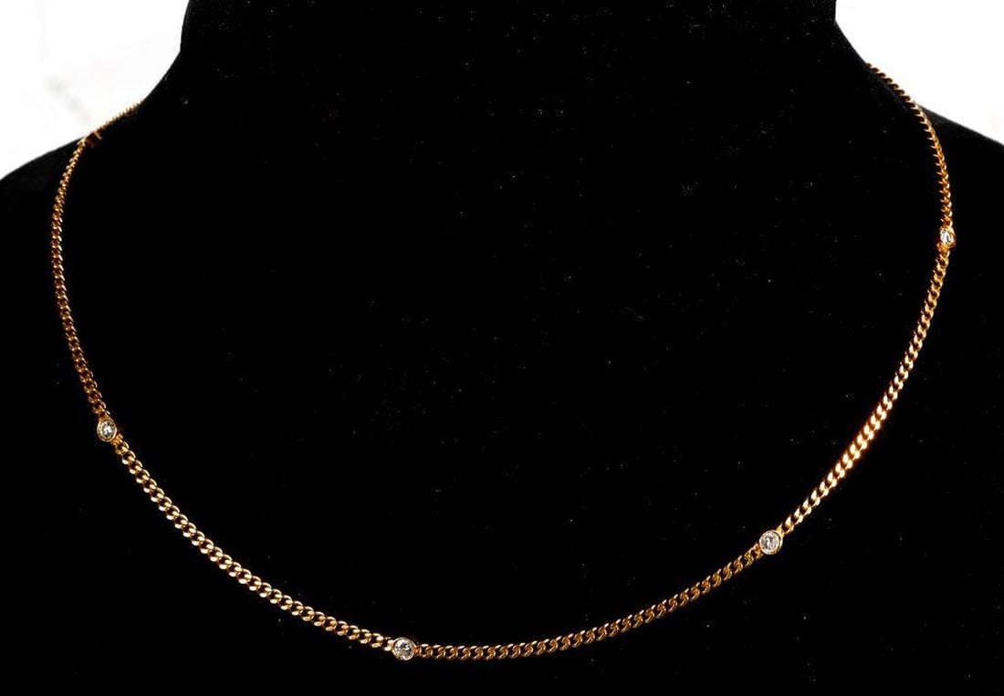 A diamond and 18k gold station necklace (1 of 3)
