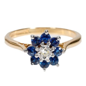 An iolite, diamond and 18k gold ring