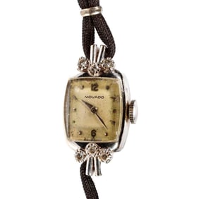 Movado, A 14k white gold, diamond ladies watch