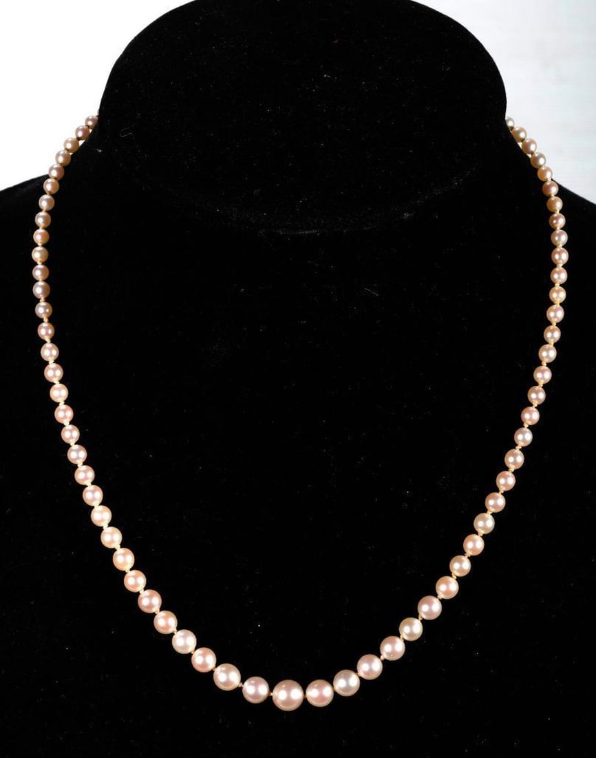 A cultured pearl and 14k white gold necklace: composed of graduated cultured pearls measuring from approximately 7.0 to 3.50mm; length; 17 1/2 in.
