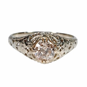 An antique diamond and 18k white gold ring