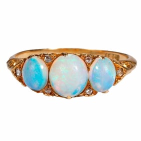 An antique opal, diamond and 18k gold ring