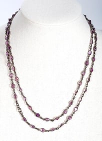 An amethyst and blackened sterling silver necklace