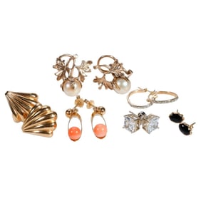 Six pairs of gold earrings