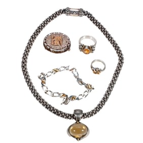 A group of sterling silver and gold jewelry