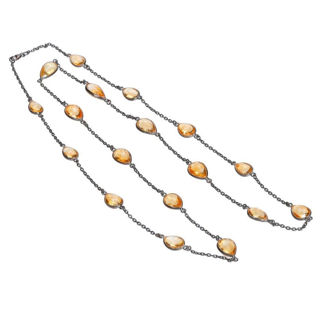A citrine and blackened sterling silver necklace: with stations of pear-shaped citrines weighing in total approximately 136.45 carats; ; length: 36in.